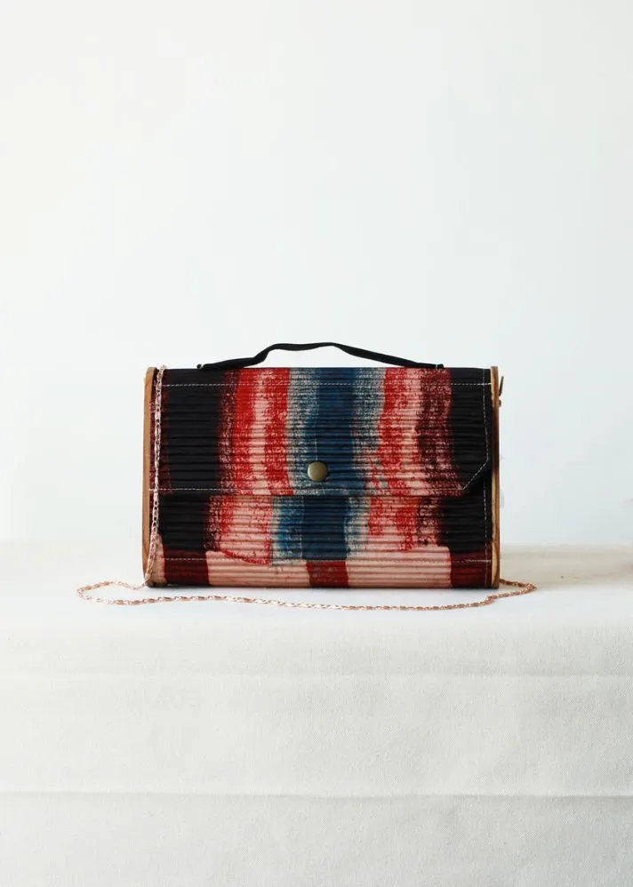Kinu Upcycled Capsule Clutch