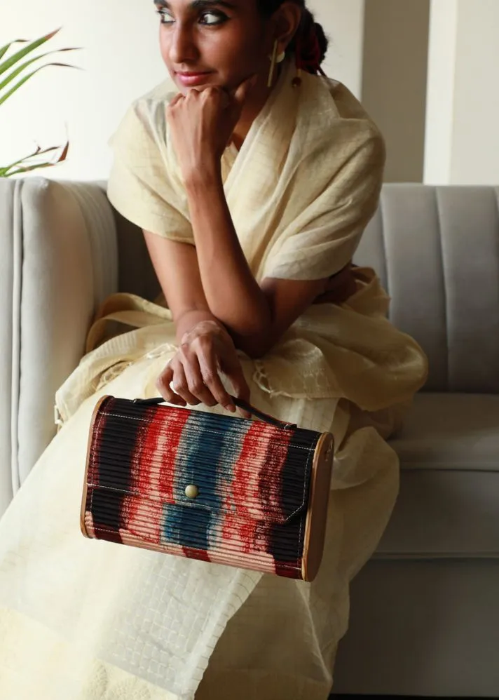 Kinu Upcycled Capsule Clutch